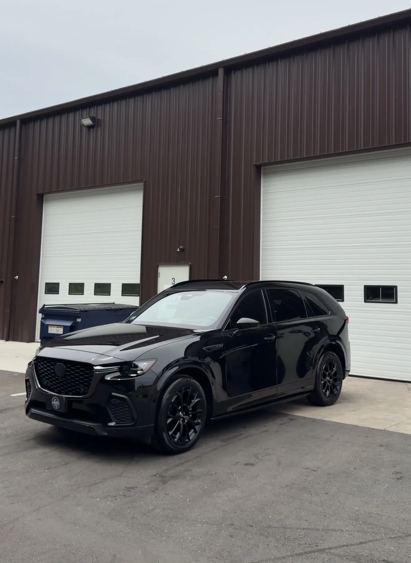 Mazda CX black wheels tint and emblem blackout Shrewsbury MA