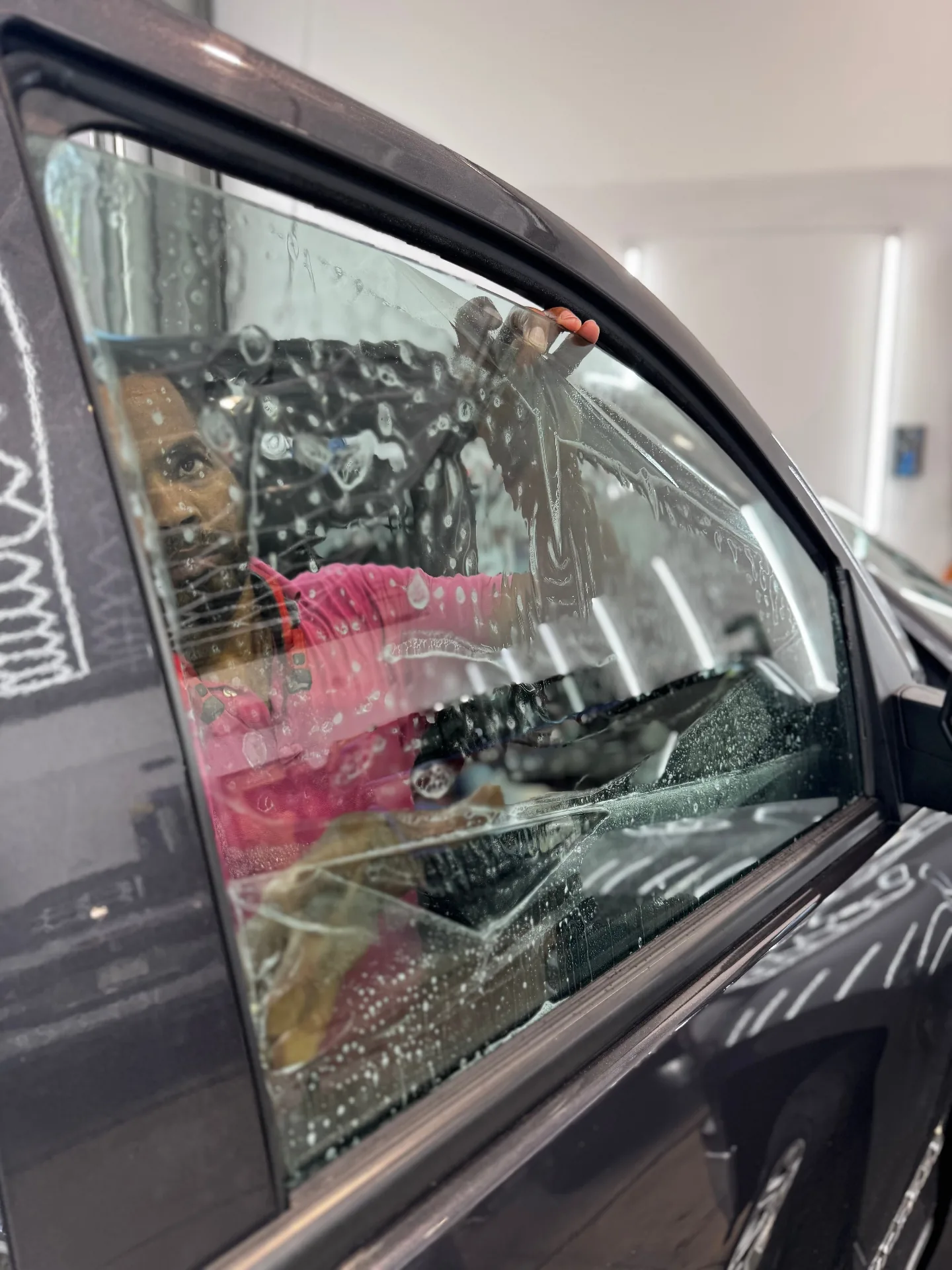 Professional window tint installation on luxury vehicle Shrewsbury MA